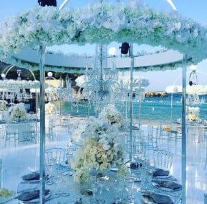 Renee Sutton wedding in Monopoli with chandeliers on the beach wedding