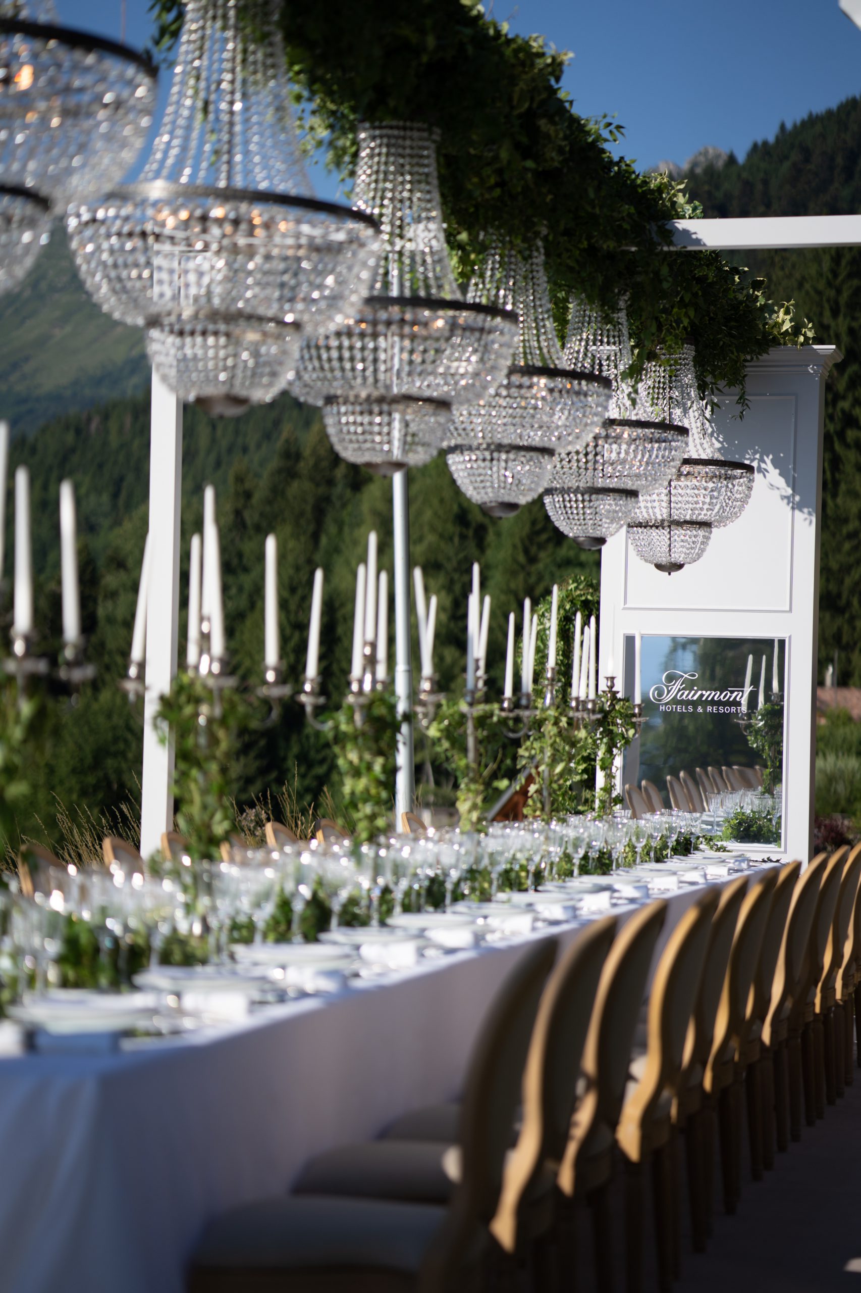 dinner table with chandeliers