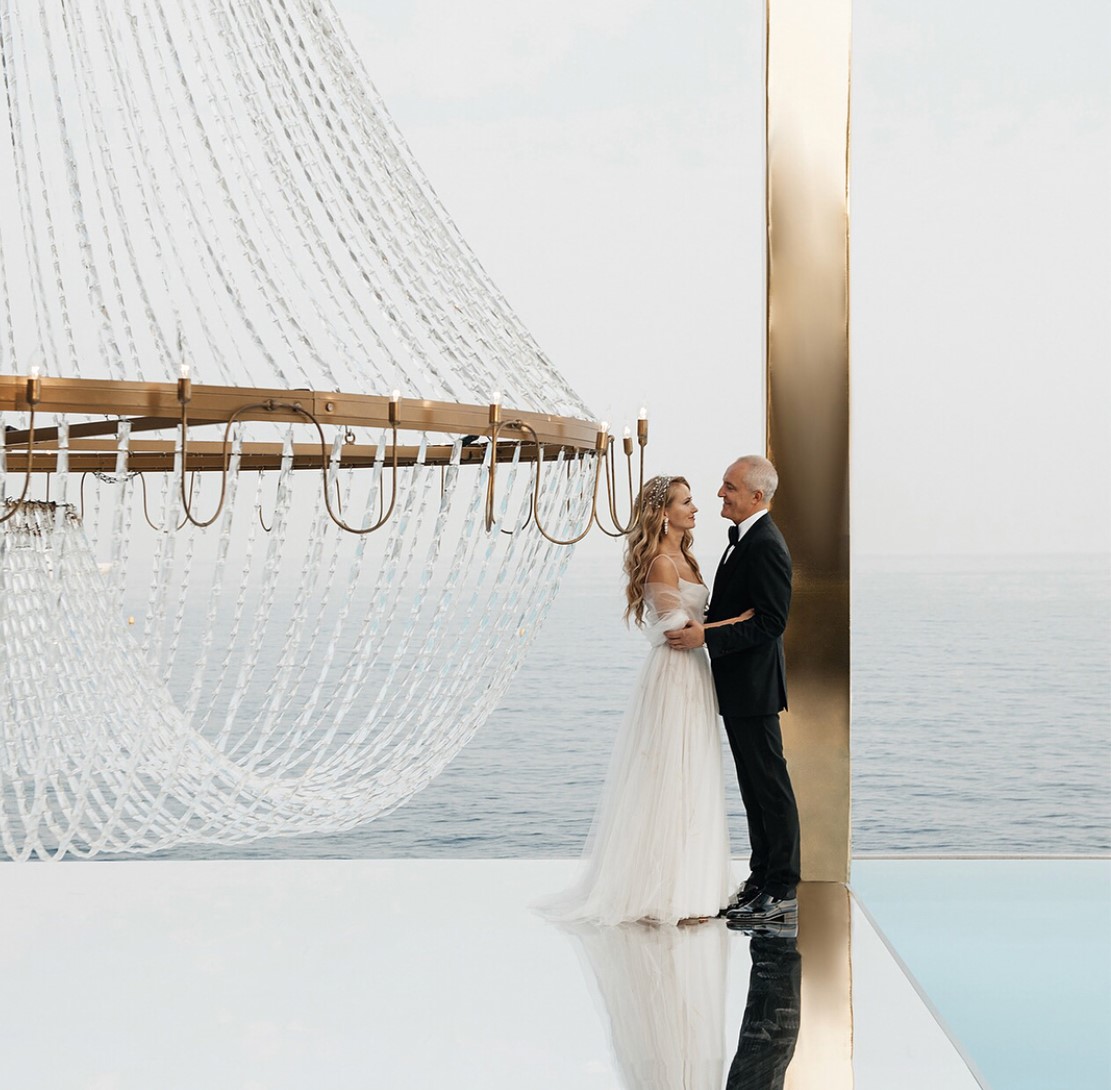 Luxury wedding reception styled with crystal chandeliers