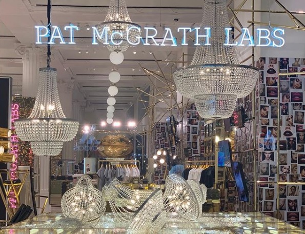 Crystal chandeliers in a Selfridges window display.